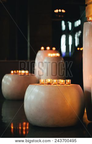 Candles In Spa Zone With Beautiful Relaxing Liight And Dlurry Colorful Backdrop.