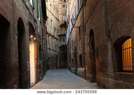 SIENA ITALY - May 10 2018: Street scene in Siena, Toscana, Italy. The historic centre of Siena has been declared by UNESCO a World Heritage Site