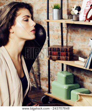 Young Pretty Woman Waiting Alone In Modern Loft Studio, Fashion Musician Concept, Lifestyle People C