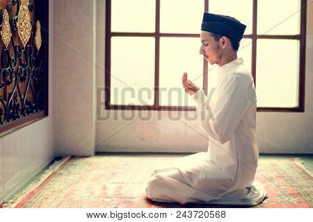 Muslim man making Dua to Allah