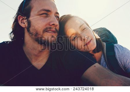 Couple hiking together in the wilderness
