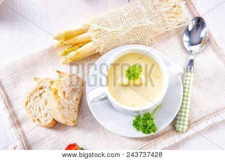 Asparagus Cream Soup With Capers And Fresh Baguette