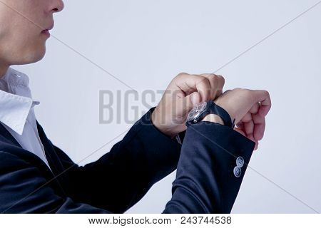 Time To Work! Businessman Checking Time On His Wrist Watch (work, Responsibility, Success, Timemanag