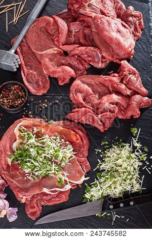 Cooking Braciole - Pounded Beef Steaks Topped On With Prosciutto, Grated Parmesan Cheese And Finely 