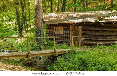 Old Wooden Cottage Next To A Stream In Sokobanja, Serbia.beautiful Nature Scenery