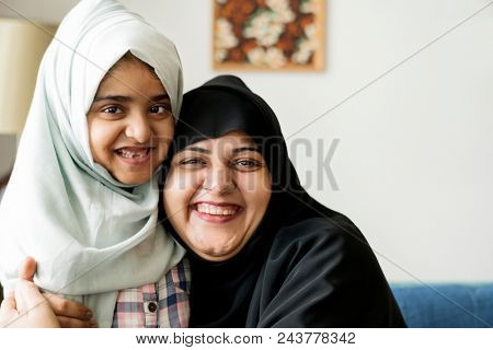 Sweet Muslim mother and daughter