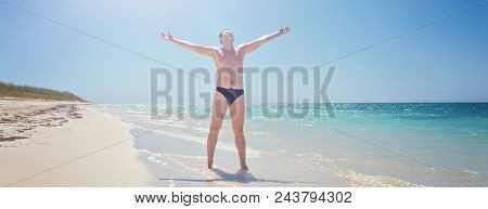 Happy Man On Beach. Rejoices To A Victory Success, Hands Up. Cuba, Playa Ankon Trinidad Caribbean Se