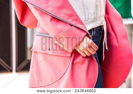 Fitting softshell coat in a store. Fashion conception.