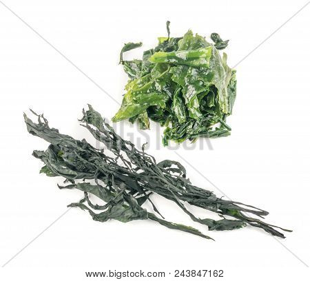 Heap Of Dry Wakame Seaweed Isolated On White Background. Healthy Algae Food