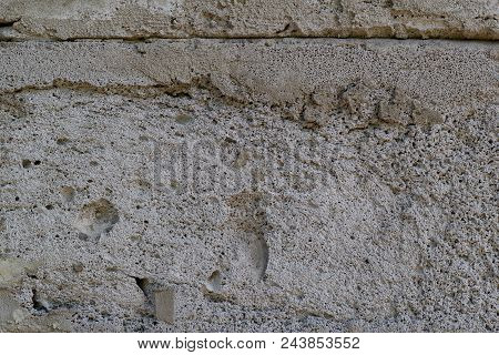 Background Of Gray Concrete Blocks Of A Wall Texture