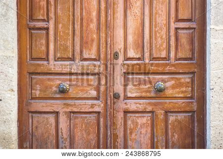 Old Wooden Door In Antique House Close-up