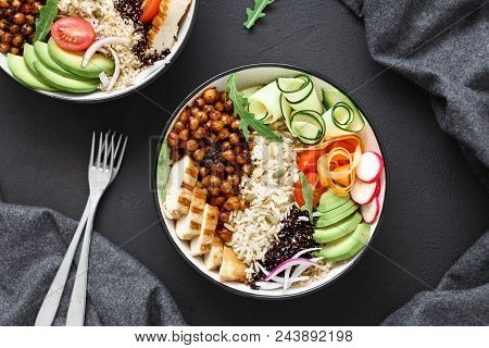 Two Buddha Bowl. Clean And Balanced Healthy Food Concept. Chicken Grilled Steak, Rice, Spicy Chickpe