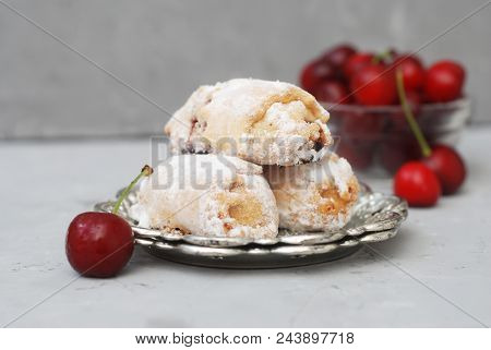 Homemade Biscuit Cookies Rolled With Cherry Jam On Gray Background.