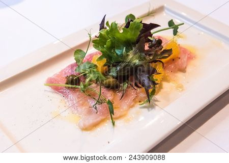 Fish Carpaccio Of Yellow Tail With Salad