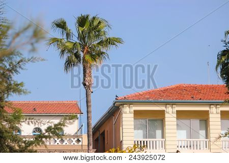 Detail Of Building In Cloudy Sky Landscape