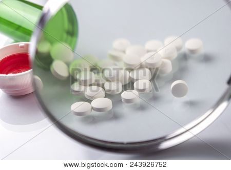Pads White In A Boat Amb Seen From A Magnifying Glass Isolated In White Background, Conceptual Image