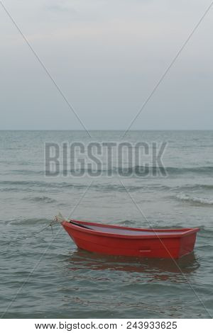 Red Boat Is Floating In The Sea