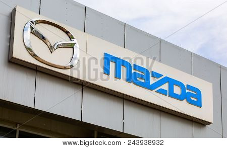 Samara, Russia - May 19, 2018: Mazda Dealership Logo On The Facade Of Official Dealer Office. Mazda 