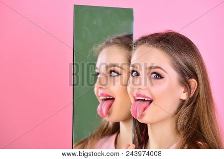 Girl Show Tongue At Mirror As Multifaceted Personality. Beauty And Fashion. Hairdresser Salon And Ma