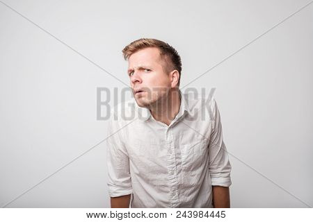 Speak Loudly. Caucasian Man Having Hearing Problem Listening To Something