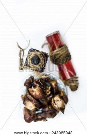 Sweet And Floral Essence Of Date Or Khajoor In Bottles Isolated On White Used In Flavored Chocolate 