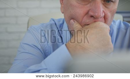 Businessman Image Reading Electronic Documents On Laptop