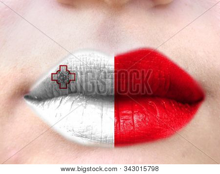 Female Lips Close Up With A Picture Flag Of Malta. Learning Languages.