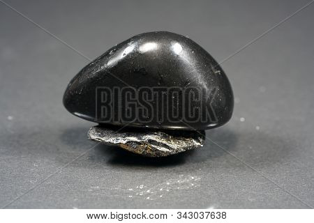A Black Rock Also Called Healing Stone Shungite, Which Consists Mainly Of Carbon Was Photographed He
