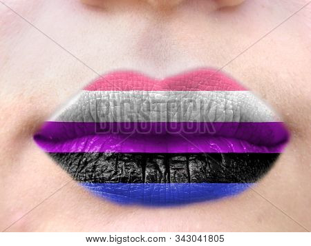 Female Lips Close Up With A Picture Flag Of Genderfluid. Learning Languages.