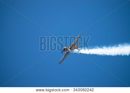 Bucharest/ Romania - Aeronautic Show - September 21, 2019: Yak 52Tw Airplanes Flying Trough The Sky