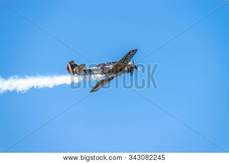 Bucharest/ Romania - Aeronautic Show - September 21, 2019: Yak 52Tw Airplanes Flying Trough The Sky