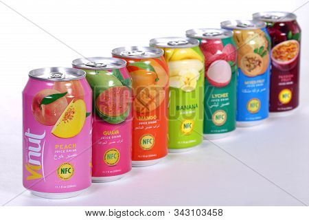 Novyy Urengoy, Russia - January 4, 2020: Line Of The Vinut Juice Drink Aluminium Cans Over Grey Back