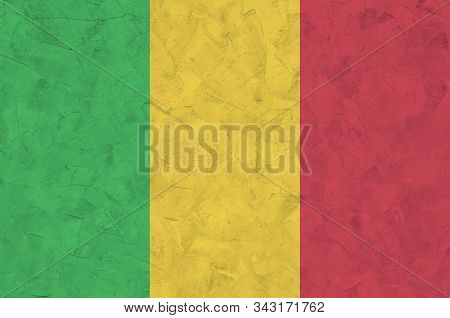 Mali Flag Depicted In Bright Paint Colors On Old Relief Plastering Wall. Textured Banner On Rough Ba