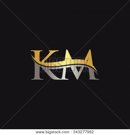 Initial Gold And Silver Letter Km Logo Design With Black Background. Abstract Letter Km Logo Design