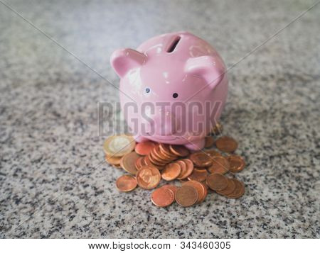 Pink Piggy Bank With Cion Pile, Step Up To Start Up Business To Suscess, Saving Money For Future Pla