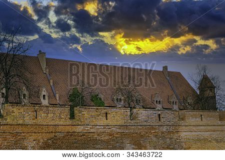 Malbork, Pomerania, Poland - January 2: Sunrise Over Castle Of The Teutonic Order In Malbork - The L