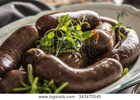 Roasted Sausages In Pan With Rosemary. Traditional European Food Bratwurst Jaternice Or Jitrnice.