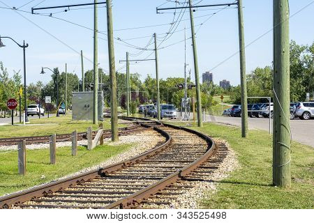 Trolley Train Track In Park With Tracks Intersecting