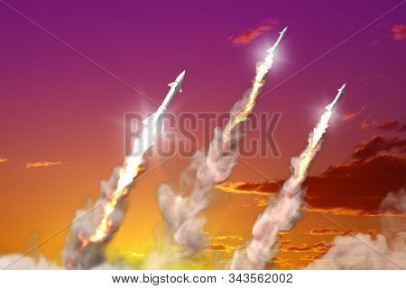 Supersonic Warheads Launch - Modern Strategic Nuclear Rocket Weapons Concept On Sunset Sky Backgroun