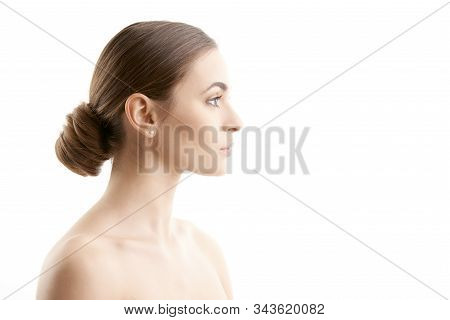 Profile Of Young Woman Smiling Against Isolated Background