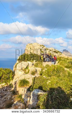 Mirador Es Colomer, Mallorca, Spain - Jan 19, 2019: People Walking On A Popular Viewpoint On The Cli
