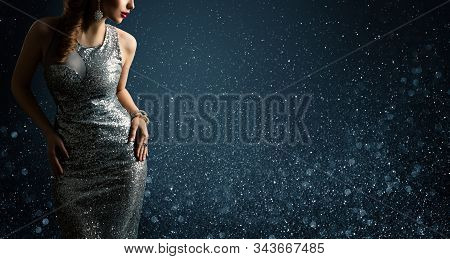 Silver Dress, Fashion Model Posing In Sparkling Sexy Gown, Woman Beauty Portrait On Lighting Sparkle