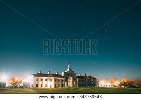 Ruzhany, Brest Region, Belarus. Night Starry Sky Above Gates To Ruzhany Palace Famous Popular Histor