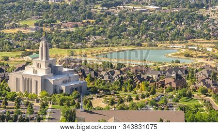 Pano Frame Temple And Geart Shaped Lake Amid Buildings And Houses In Salt Lake City Utah