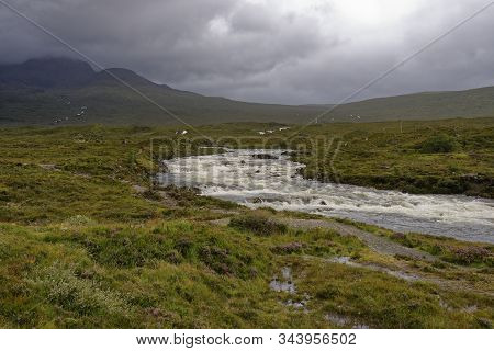 River Sligachan In Spate With Sgurr A Bhasteir (left), Cuillin Hills, Isle Of Skye, Western Isles; S