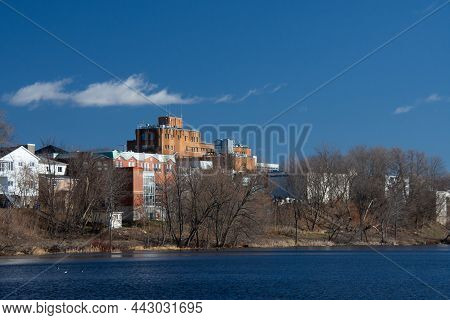 View Of The Backyard Of The Buildings On The Main Street Of Magog From The Other Side Of The River