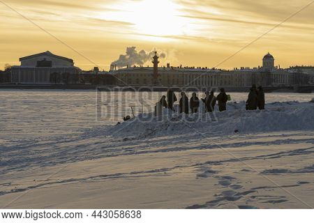 Saint Petersburg, Russia - February 22, 2021: Cadets Clear Drifts Of Freshly Fallen Snow On Zayachy 