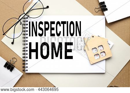 Home Incpection. Text On Bound Notebook On Brown Background.