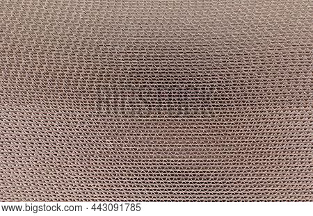Fiberboard Background. The Texture Of Fibreboard. Pressed Cardboard Close-up
