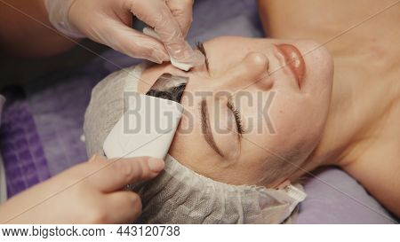 Woman Cleansing Facial In Spa Salon. Water Oxygen Face H2o2 Small Bubble Facial Rf Lifting Equipment